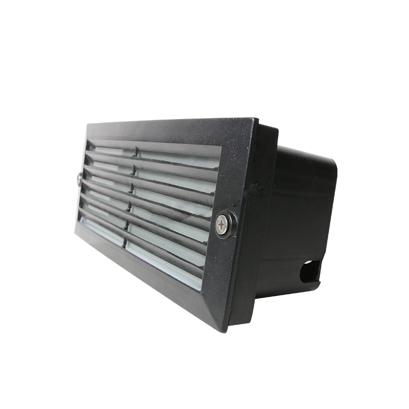 Energy-efficient LED step lights providing subtle lighting on wooden deck stairs.